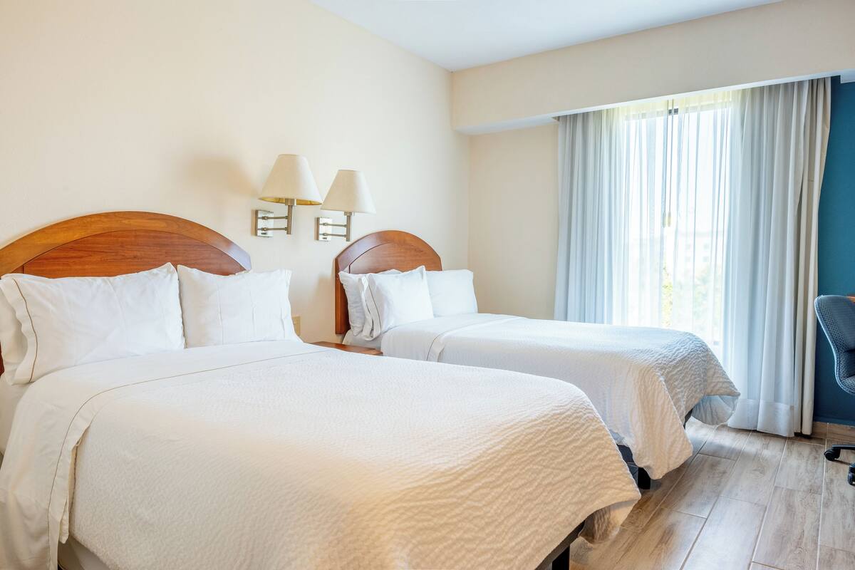 superior room, 2 double beds | premium bedding, desk, iron/ironing board, free wifi
