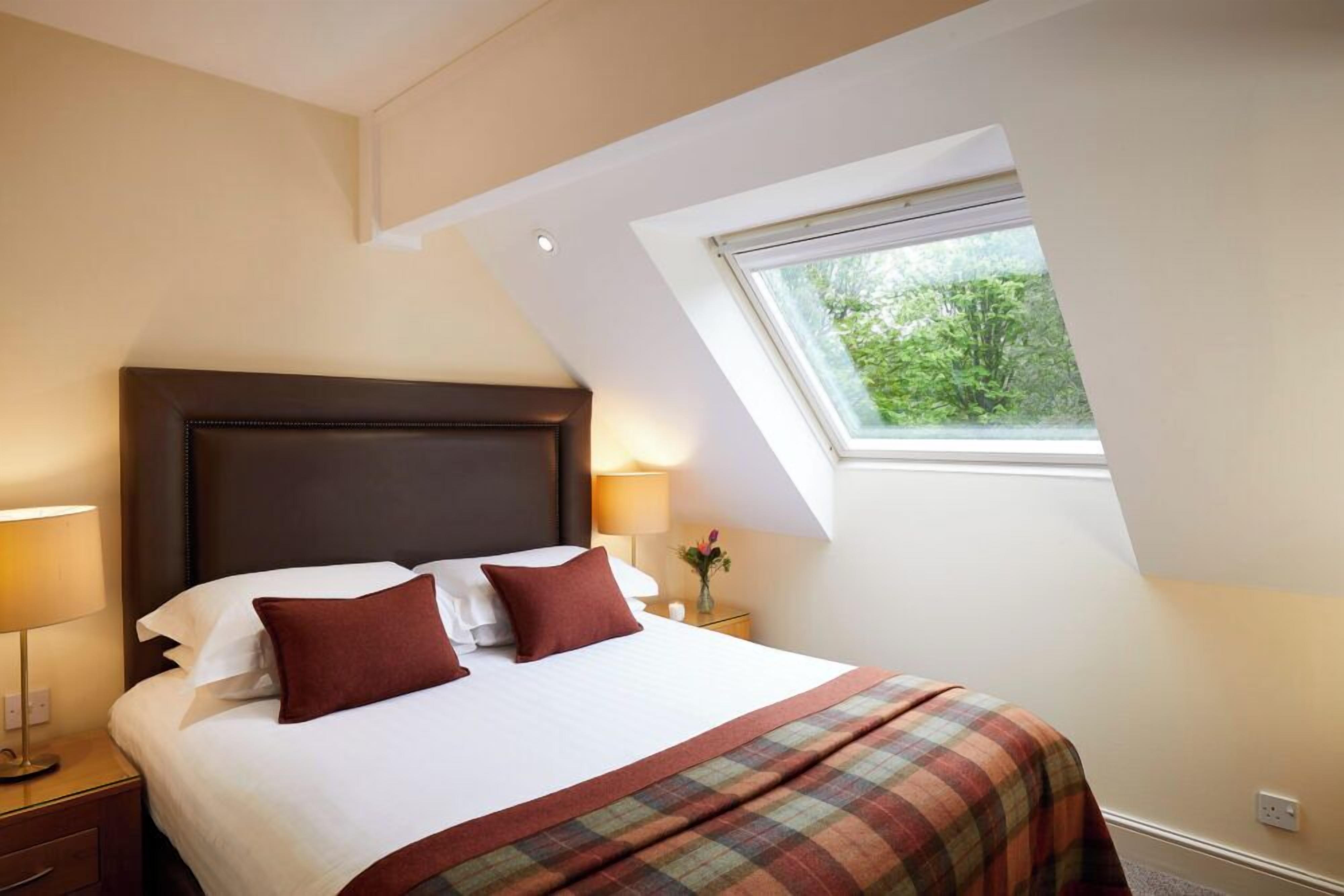 Departamento Deluxe, varias camas | Escritorio, cortinas blackout y tabla de planchar con plancha 