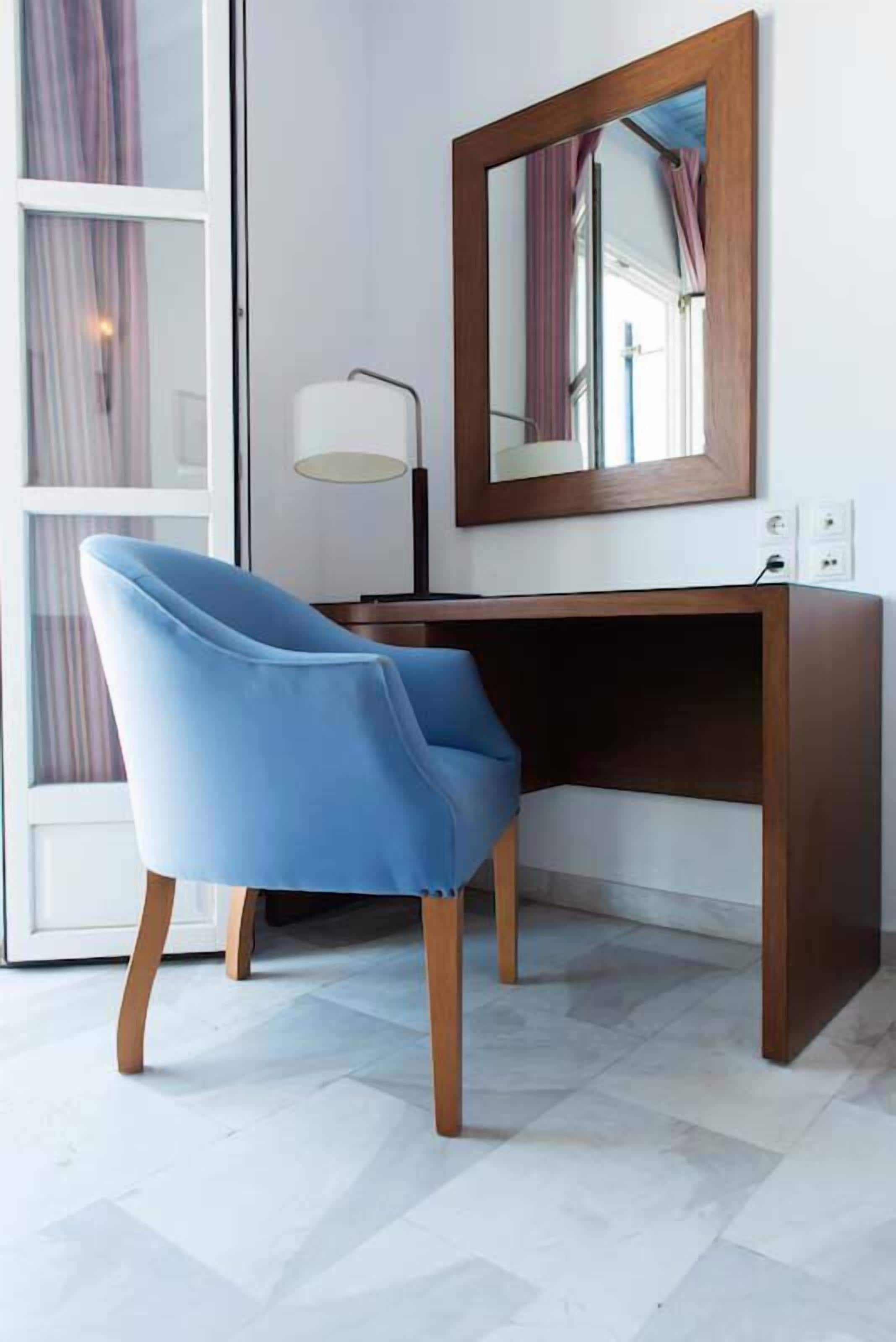 deluxe room | living area | 17-inch plasma tv with digital channels, tv