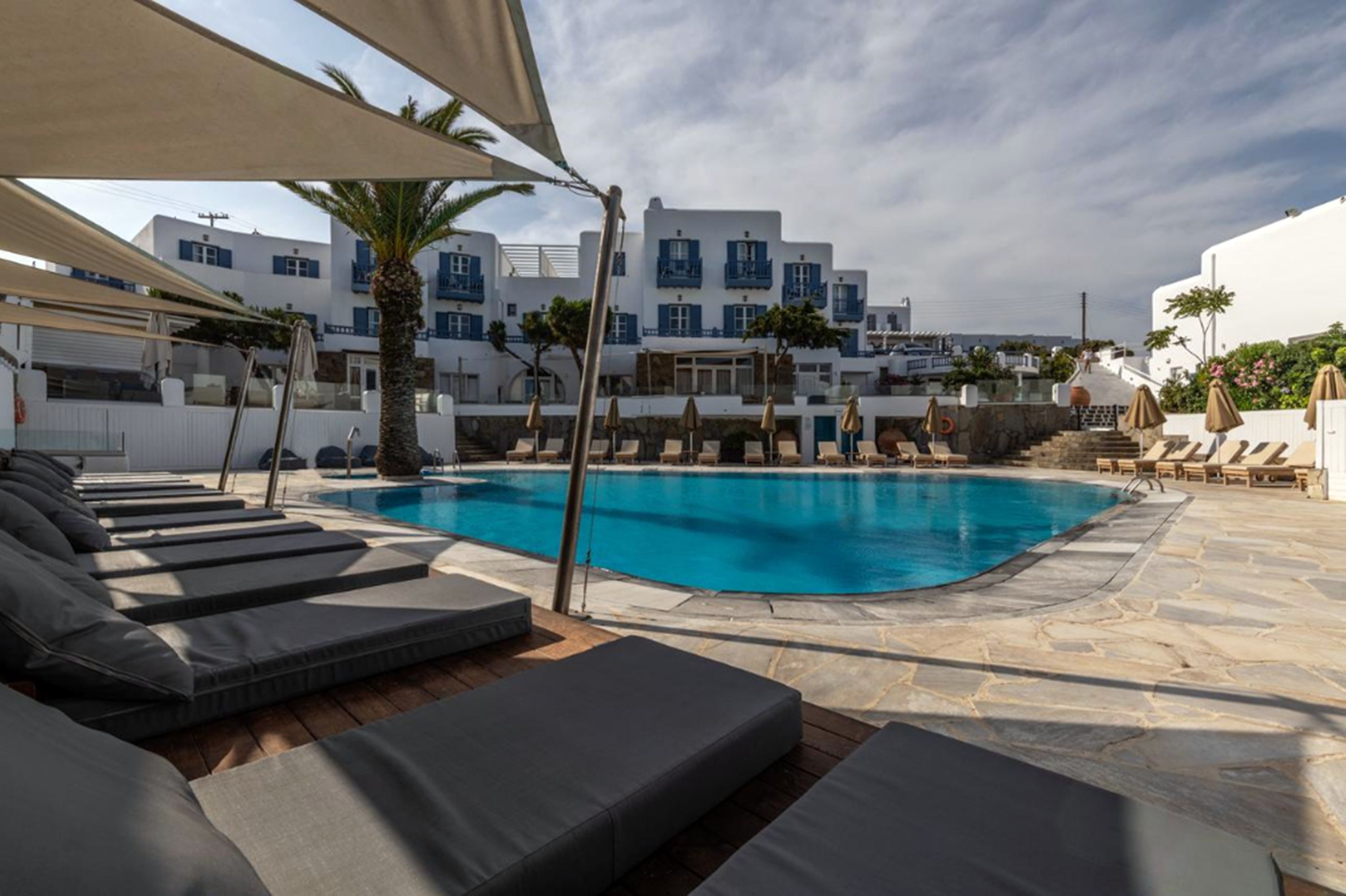 Outdoor pool, pool umbrellas, sun loungers