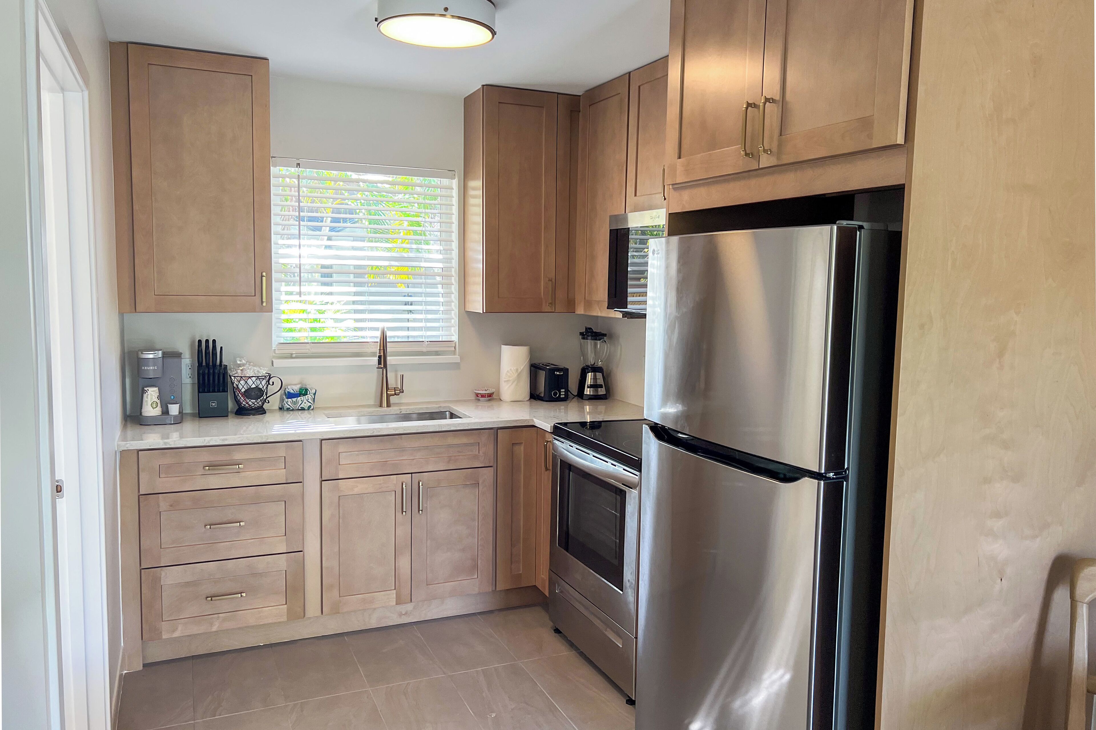 Studio, 1 King Bed, Mobility Accessible, Poolside | Private kitchen | Fridge, microwave, coffee/tea maker, freezer