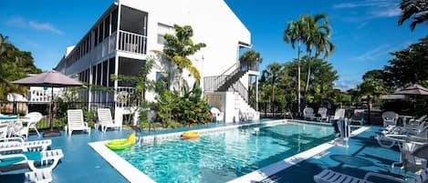 Outdoor pool, open 9:00 AM to 8:00 PM, pool umbrellas, pool loungers