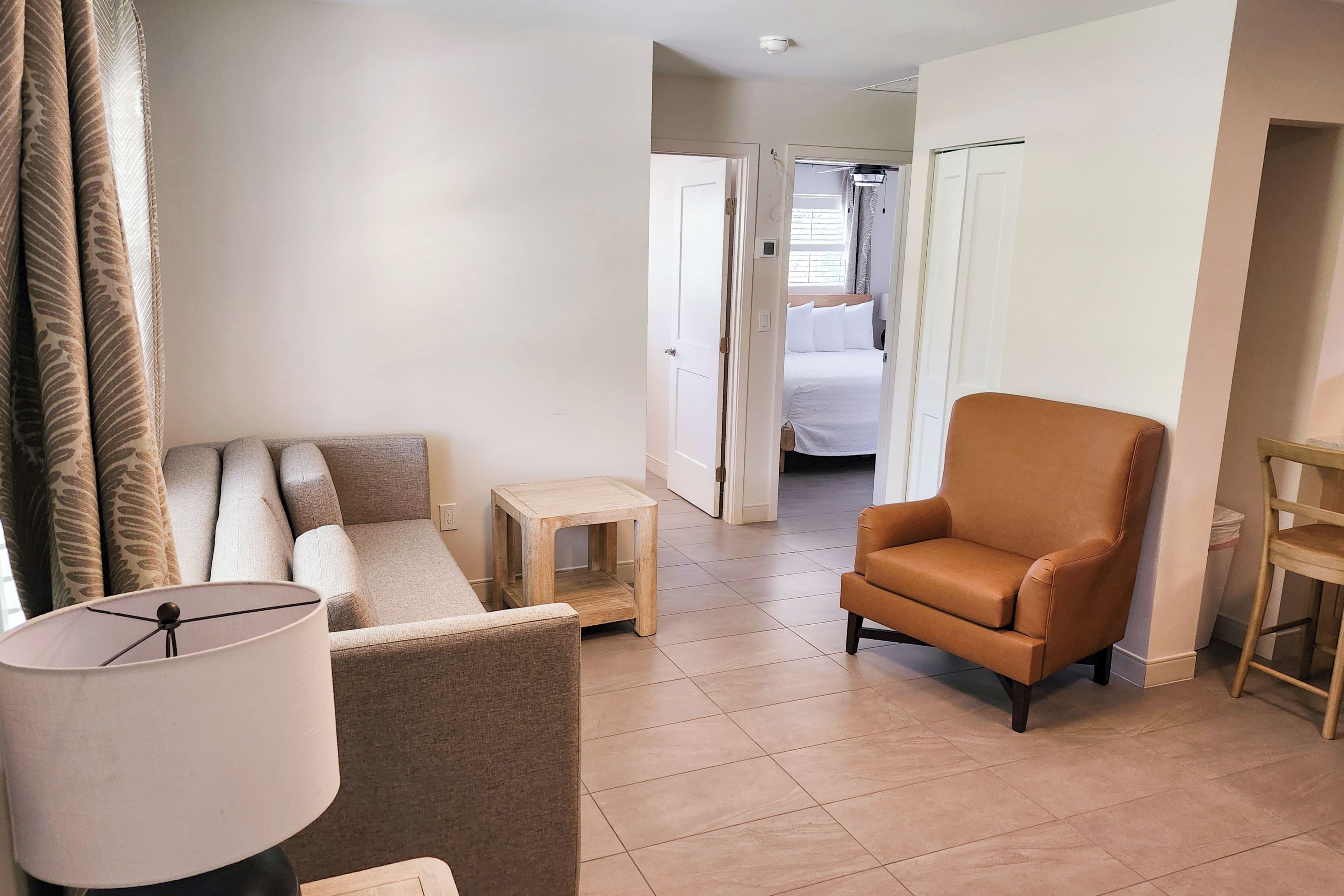 suite, 2 bedrooms, kitchen, poolside | living area | 43-inch flat-screen tv with cable channels, tv