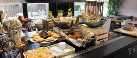 Daily buffet breakfast (EUR 14 per person)