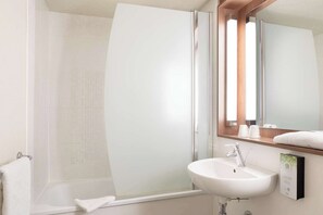 Eco-friendly toiletries, hair dryer, towels