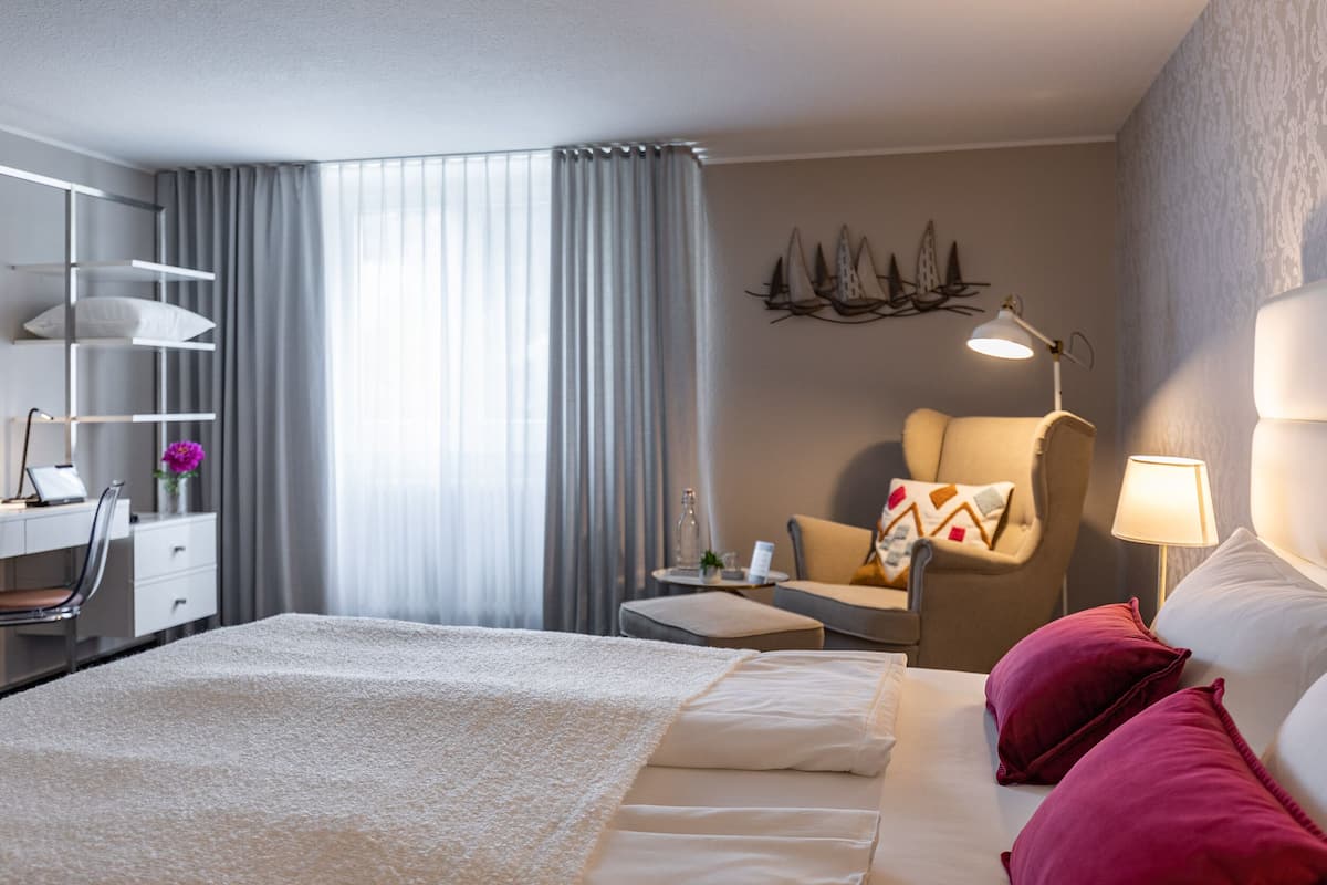standard double room | hypo-allergenic bedding, down duvets, in-room safe, desk