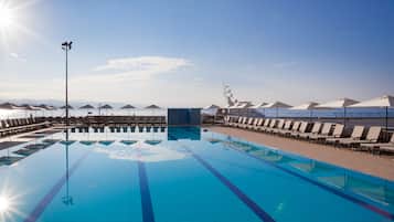 Indoor pool, seasonal outdoor pool, pool umbrellas, pool loungers
