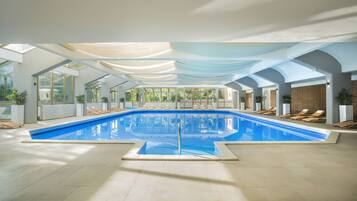 Indoor pool, 2 outdoor pools, open 8:00 AM to 8:00 PM, pool umbrellas