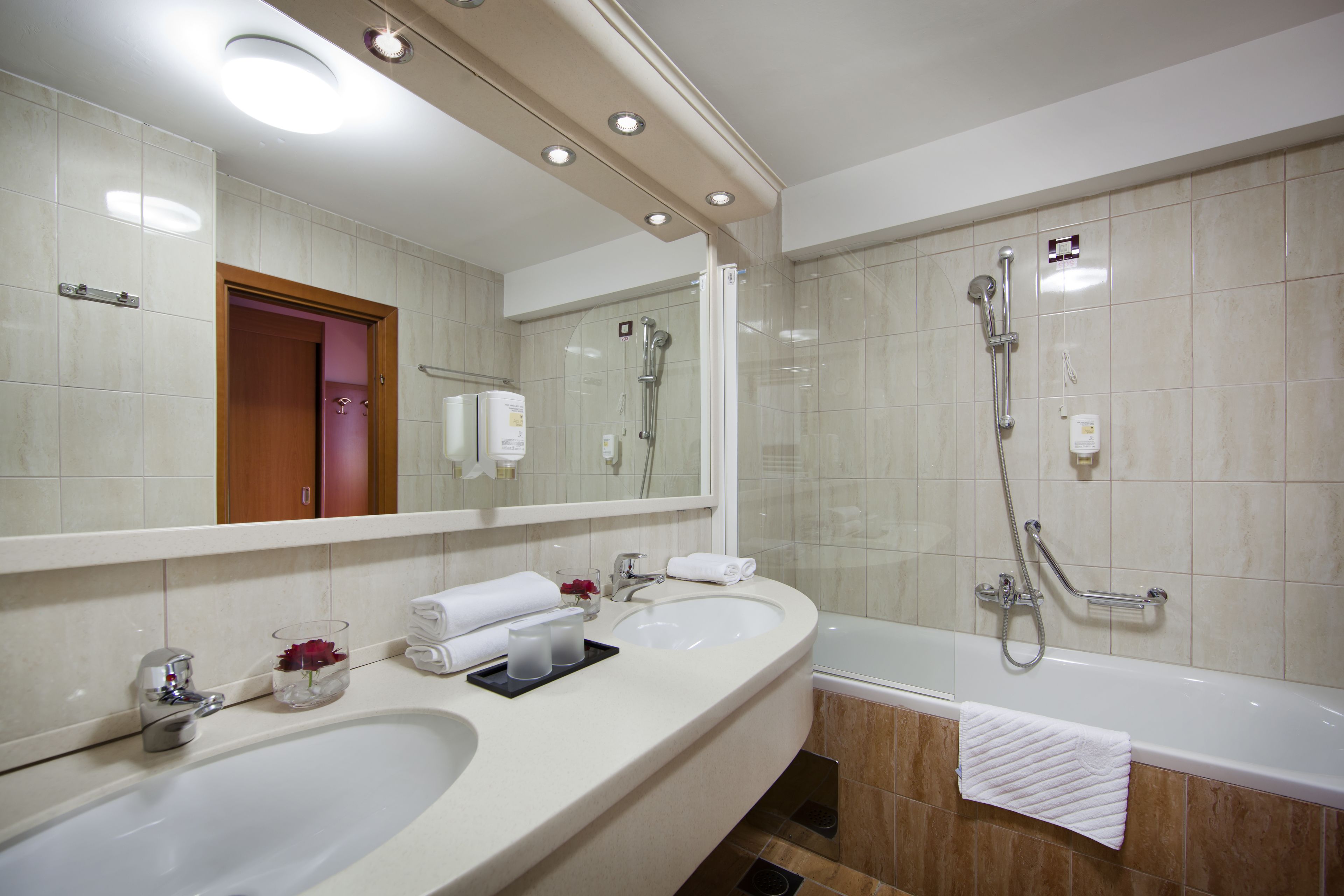 hair dryer, slippers, towels, soap