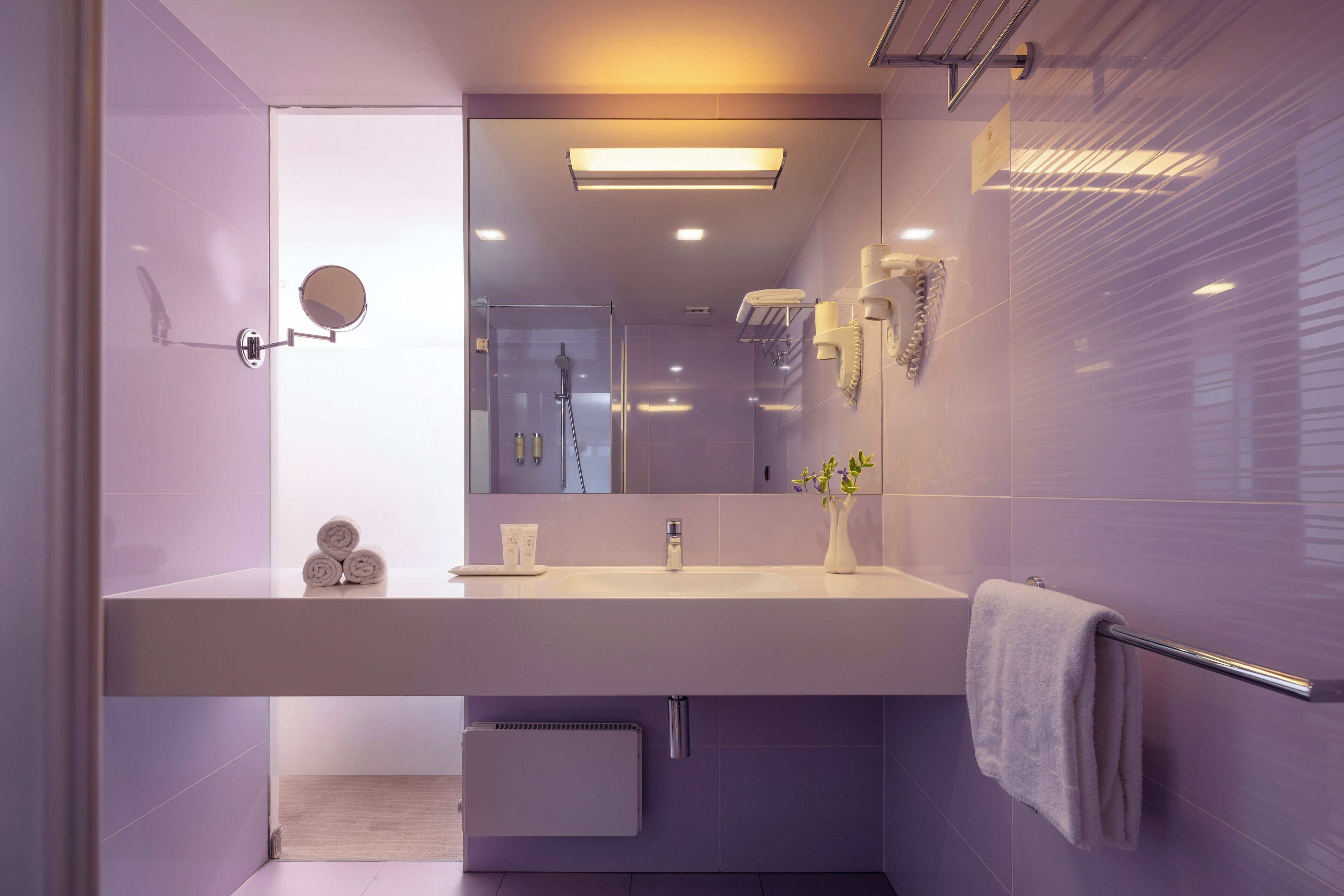 comfort twin room, sea facing | bathroom | shower, free toiletries, hair dryer, bathrobes