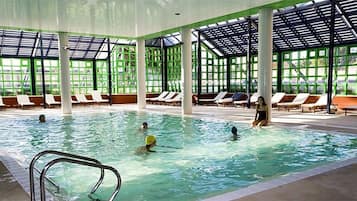 Indoor pool, outdoor pool, pool umbrellas