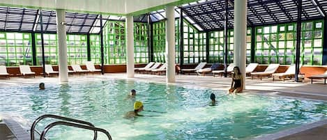 Indoor pool, outdoor pool, pool umbrellas