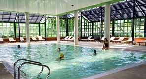 Indoor pool, outdoor pool, pool umbrellas