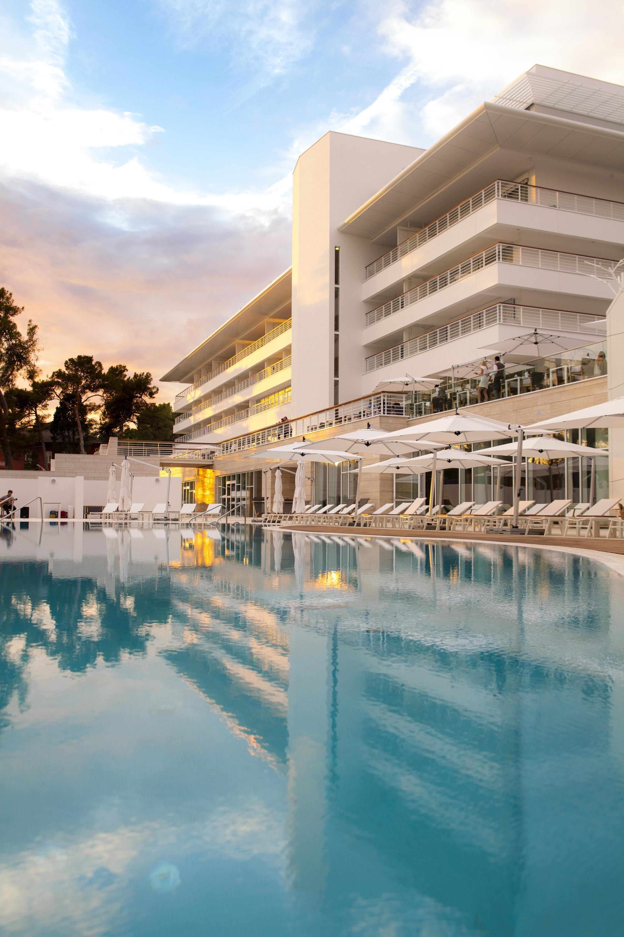 indoor pool, seasonal outdoor pool, open 8 am to 9 pm, pool loungers