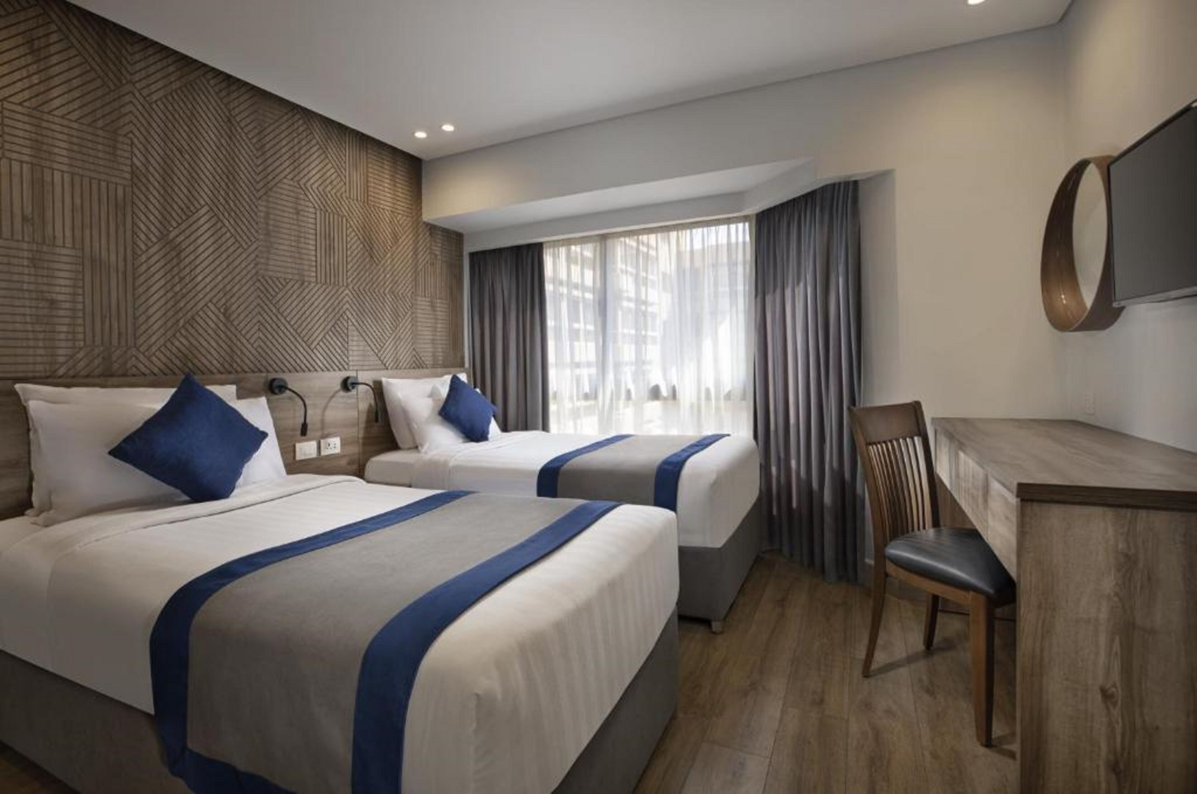 Minibar, in-room safe, blackout drapes, free WiFi