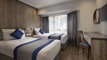 Minibar, in-room safe, blackout drapes, free WiFi