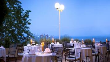 Lunch, dinner served; local cuisine, sea views