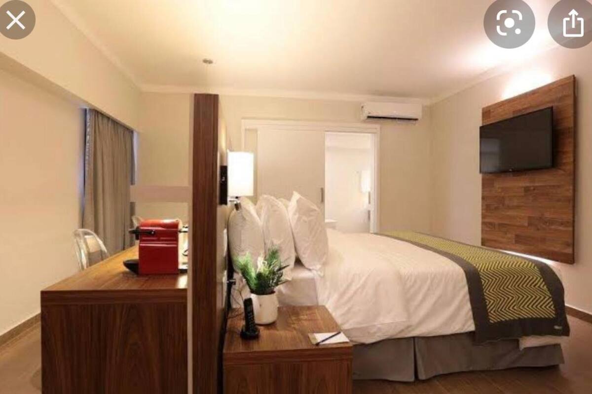 Classic Suite, 1 King Bed, Accessible, City View | Minibar, in-room safe, desk, blackout drapes