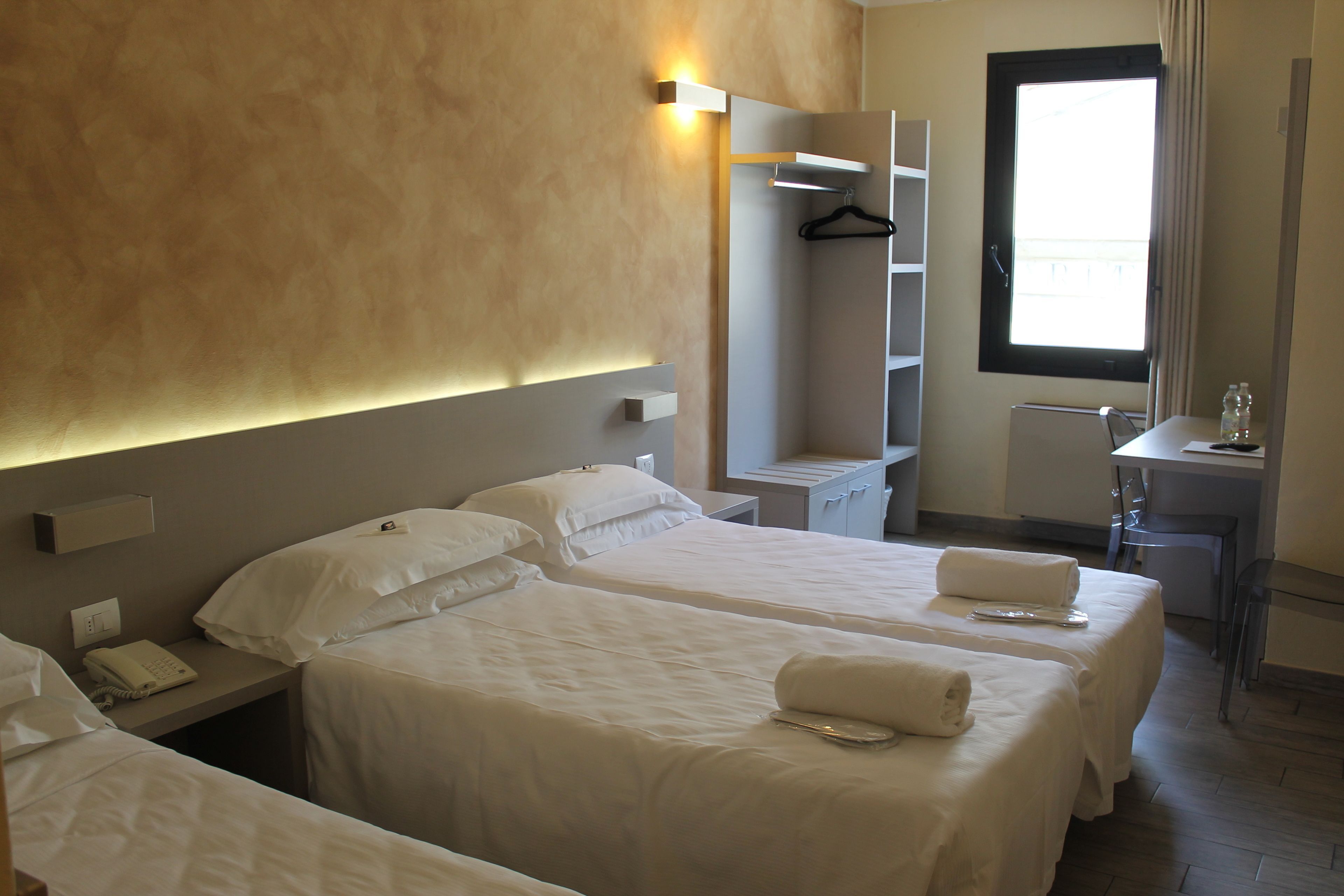 Premium bedding, down comforters, minibar, in-room safe