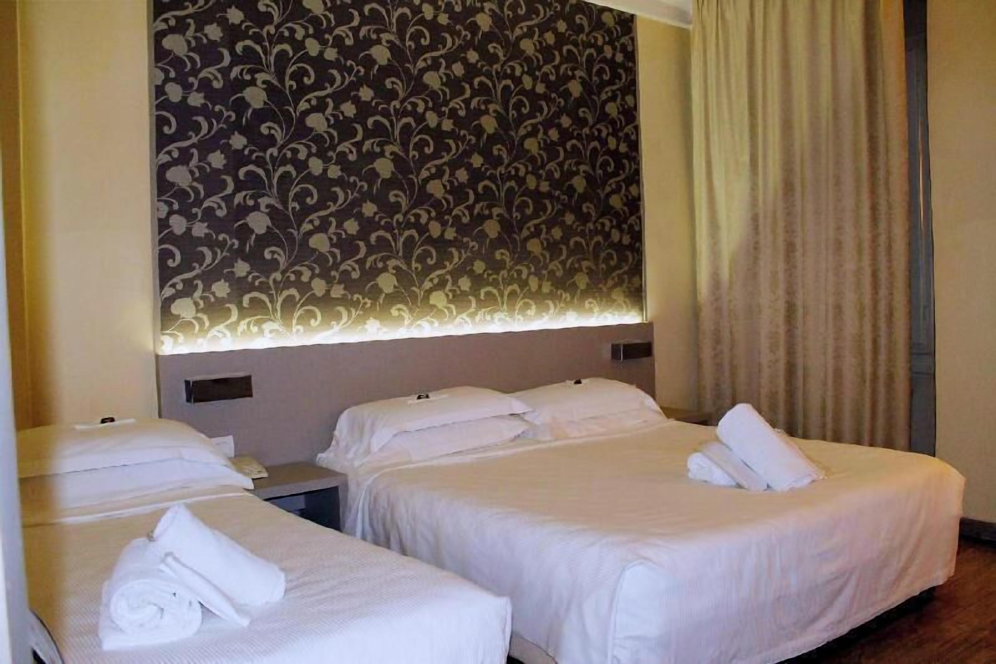 Premium bedding, down comforters, minibar, in-room safe