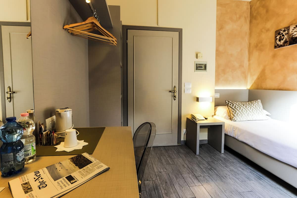 Habitación individual | Ropa de cama de alta calidad, edredón y minibar