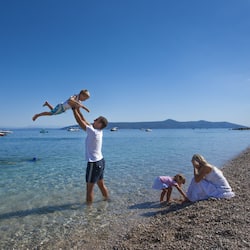Beach nearby, white sand, sun loungers, beach umbrellas