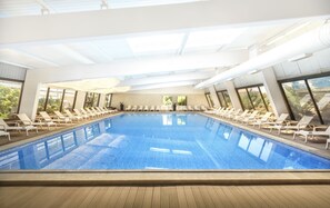Indoor pool, seasonal outdoor pool, pool umbrellas, pool loungers