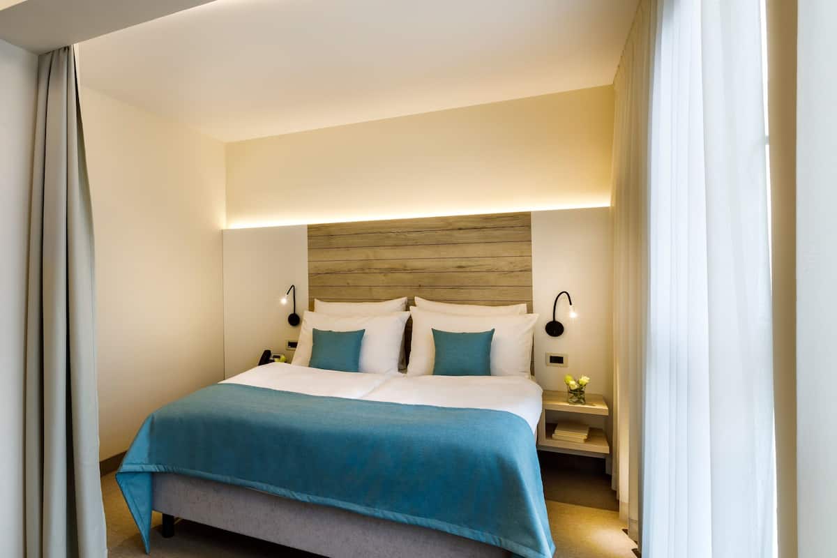 Standard Double Room | 1 bedroom, hypo-allergenic bedding available, minibar, in-room safe