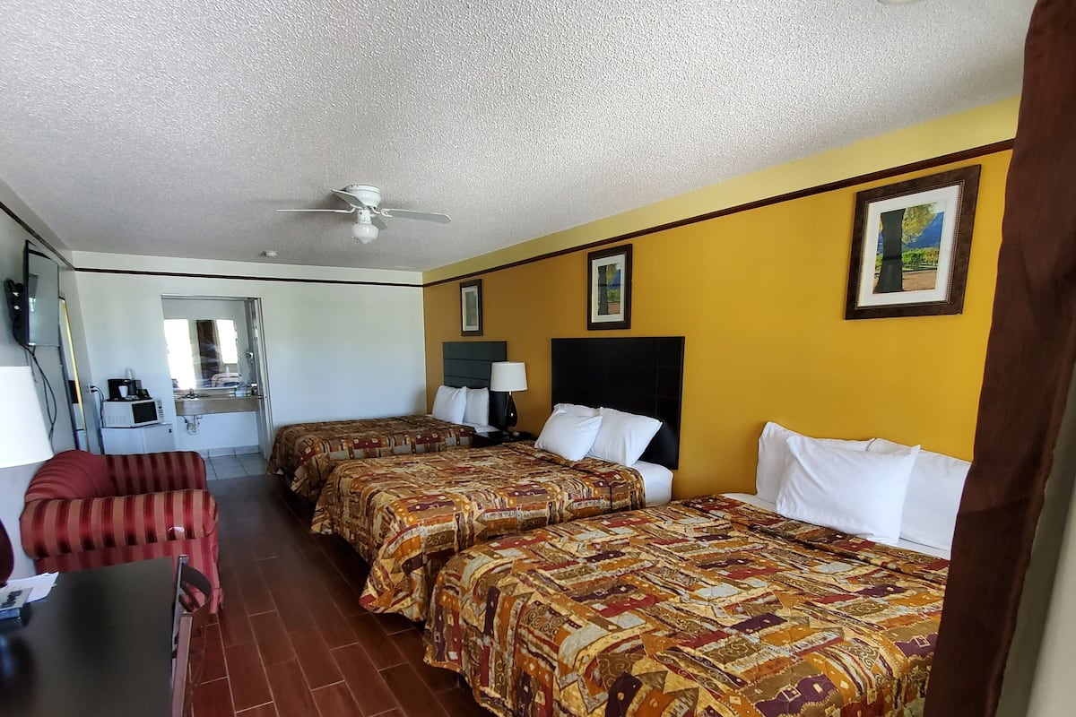 Standard Room, Three Queen, Non Smoking | Hypo-allergenic bedding, desk, blackout drapes, iron/ironing board