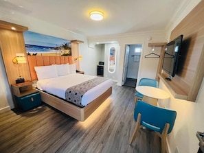 Deluxe One Queen Bed | Desk, laptop workspace, blackout drapes, iron/ironing board