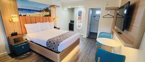 Deluxe One Queen Bed | Desk, laptop workspace, blackout drapes, iron/ironing board