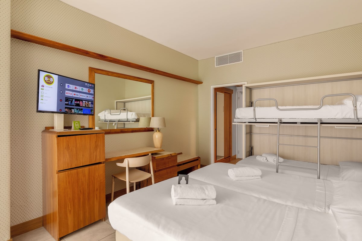 Standard Quadruple Room, Non Smoking | Minibar, in-room safe, desk, blackout curtains