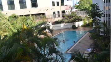 Outdoor pool, pool umbrellas, sun loungers