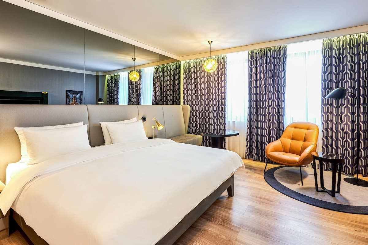Premium bedding, down comforters, memory foam beds, minibar