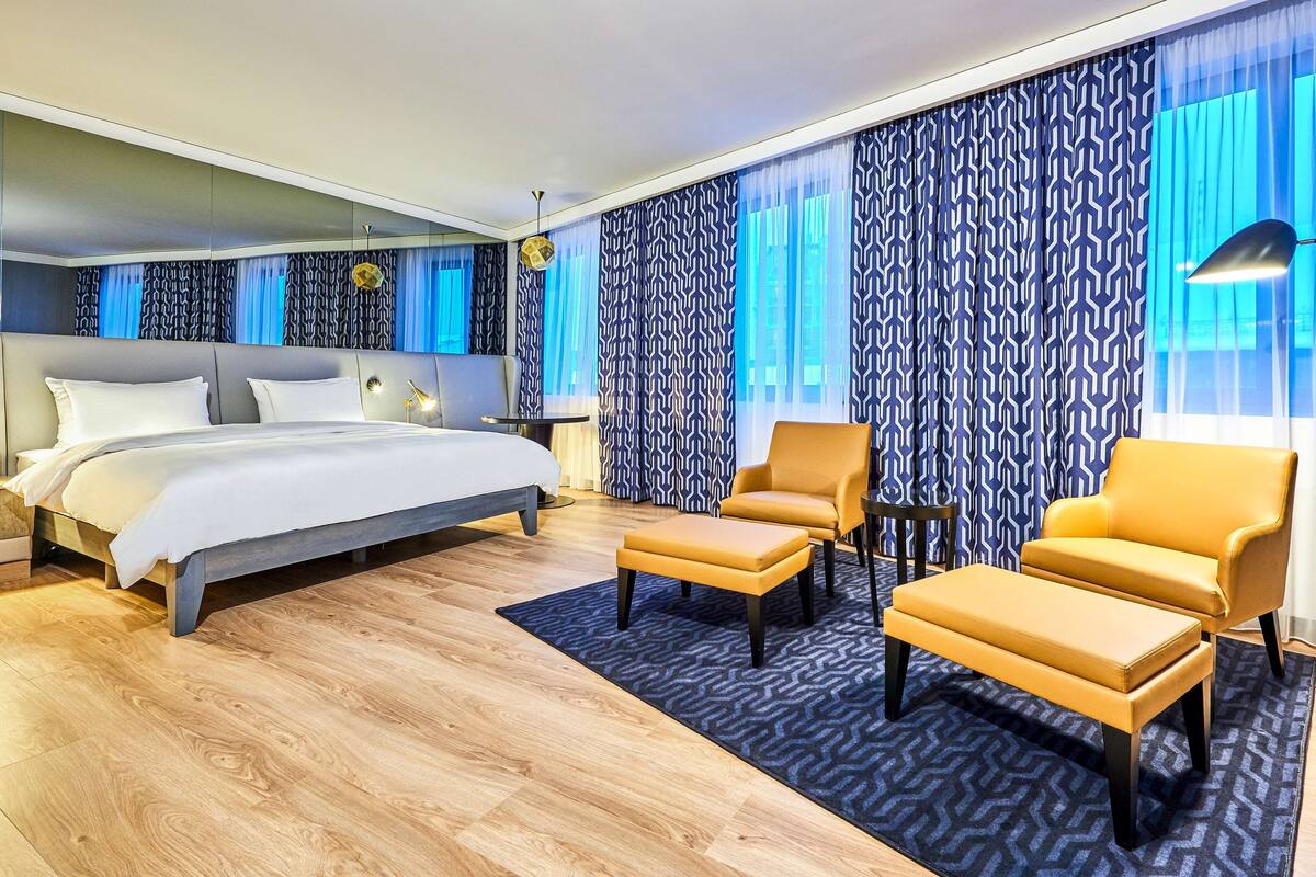 Premium bedding, down comforters, memory foam beds, minibar