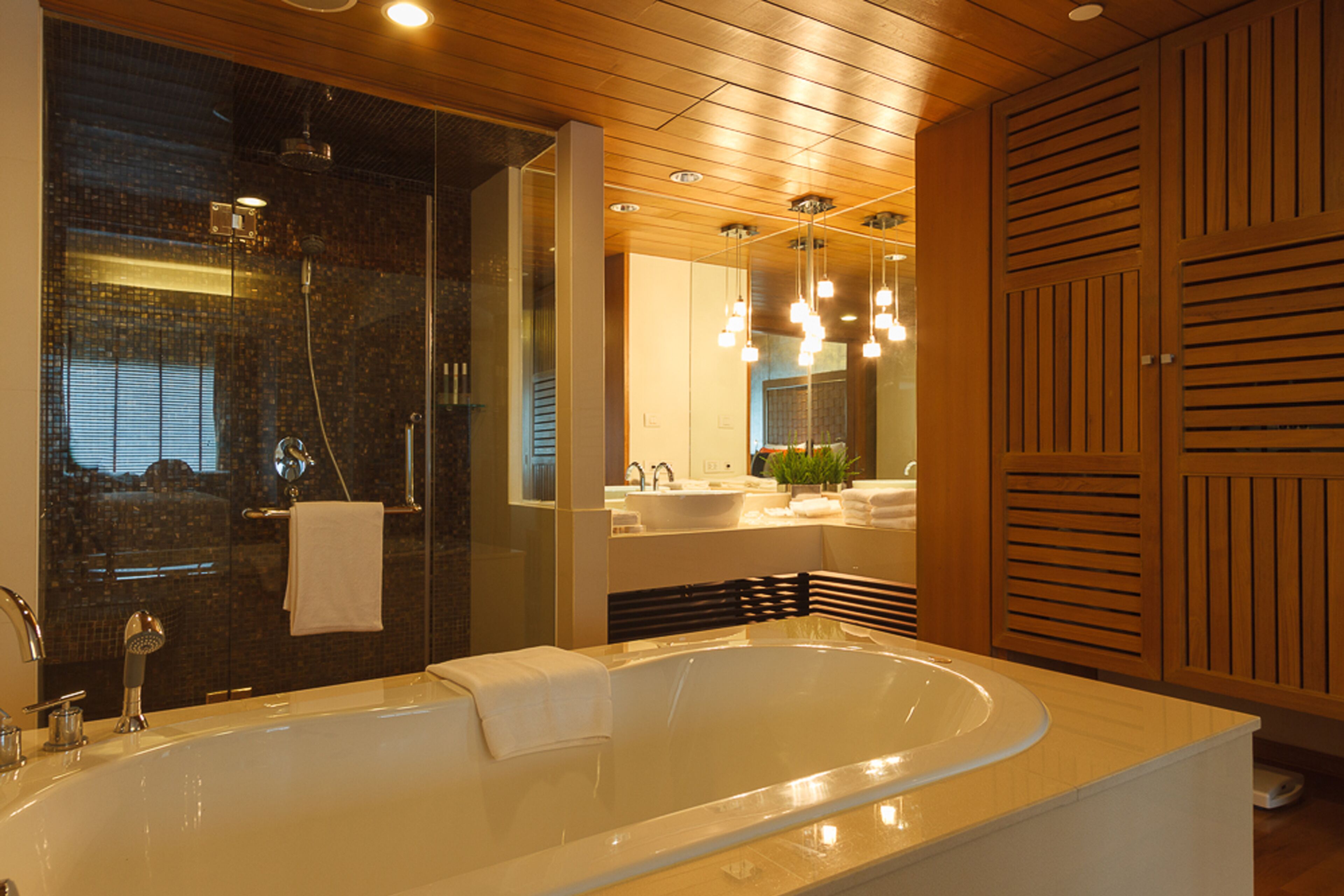 designer toiletries, hair dryer, dressing gowns, slippers