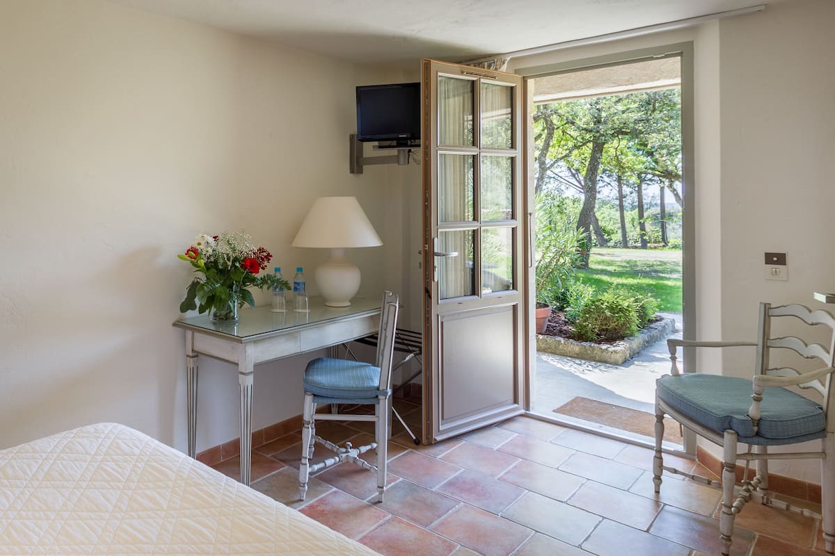 double room, garden area | premium bedding, pillow-top beds, minibar, in-room safe