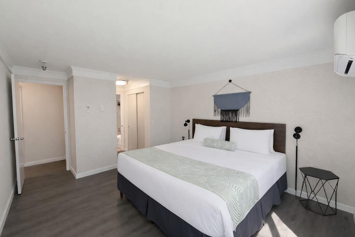 Family Suite, 2 Bedrooms | Laptop workspace, iron/ironing board, free WiFi, bed sheets