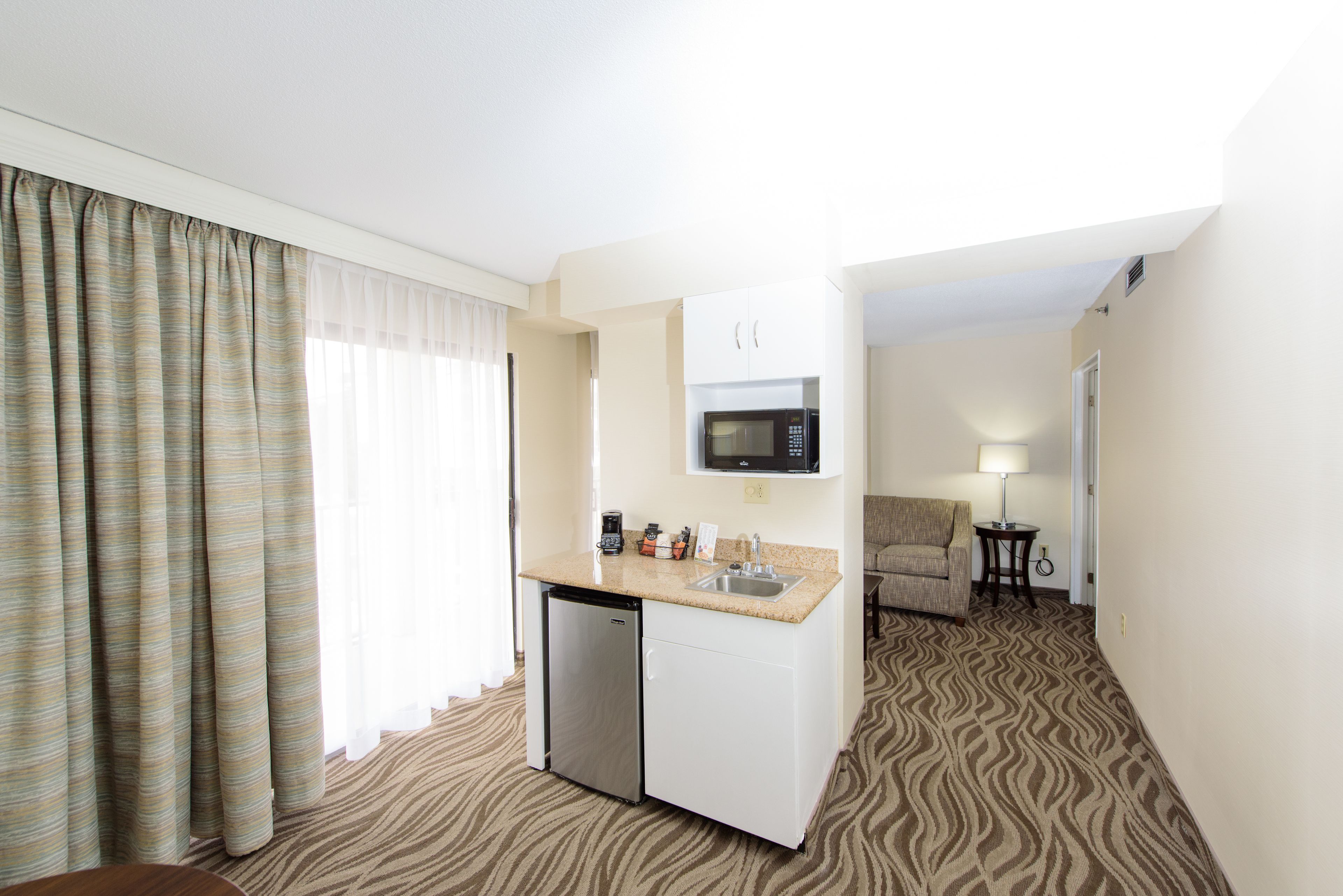 suite, multiple beds, lake view | in-room safe, blackout curtains, iron/ironing board, free wifi