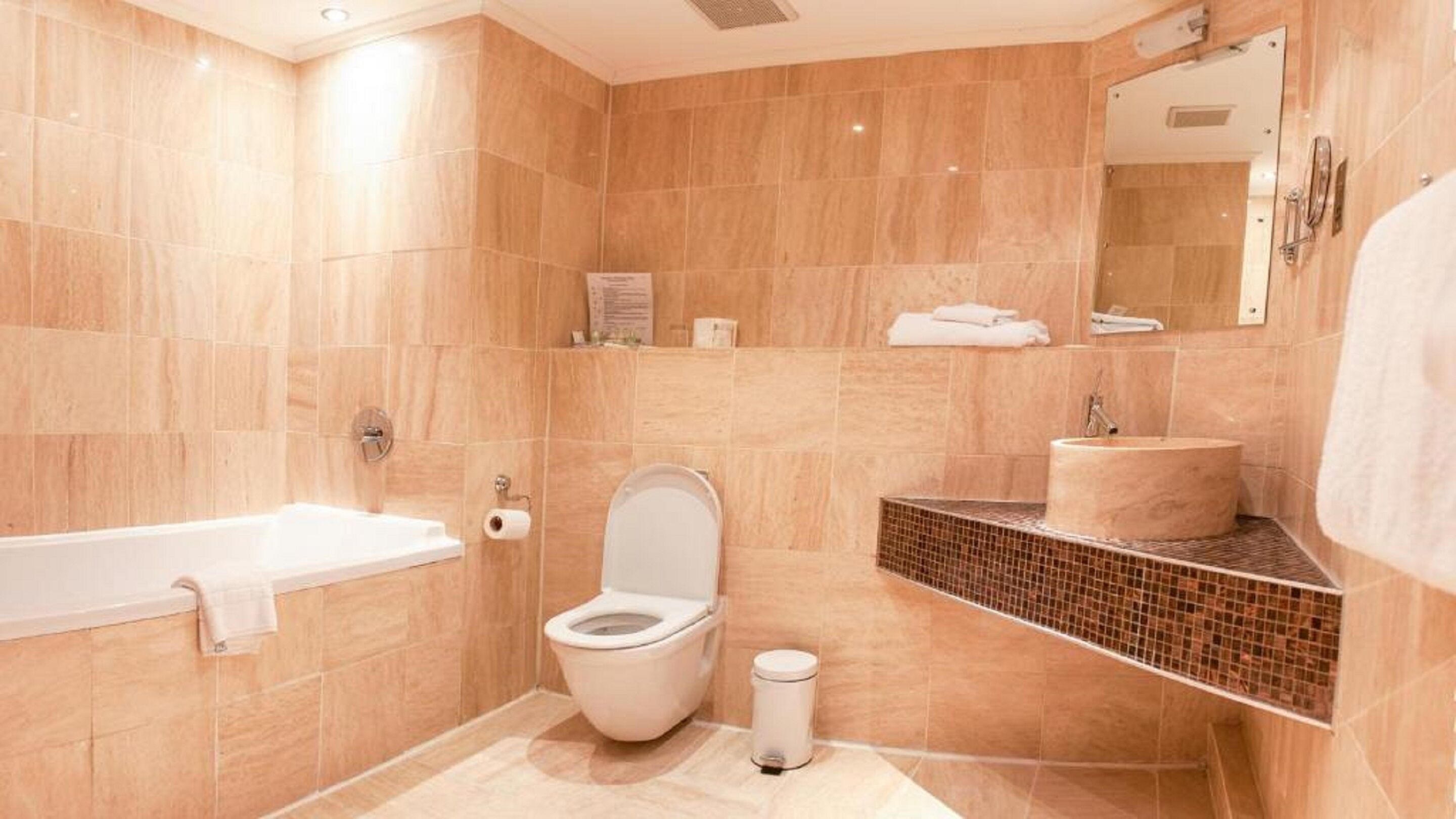 suite (king, with hot tub) | bathroom | hair dryer, towels