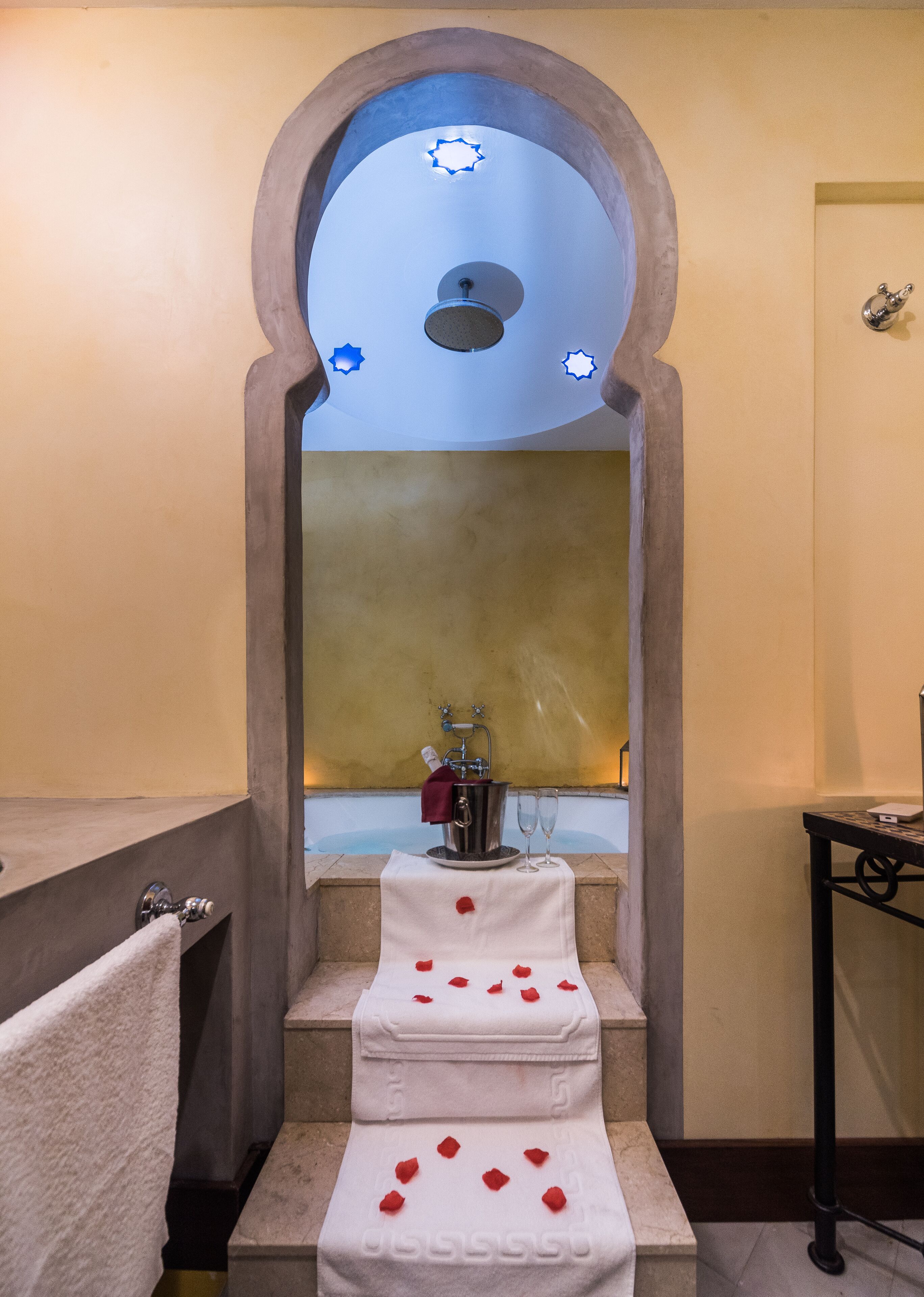 romantic room, jetted tub | bathroom | hair dryer, towels, soap, shampoo