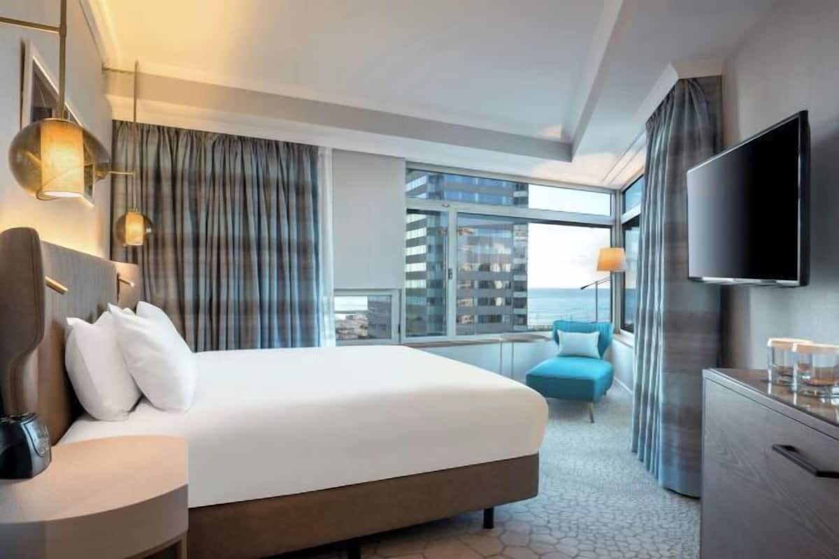Hypo-allergenic bedding available, down comforters, in-room safe, desk