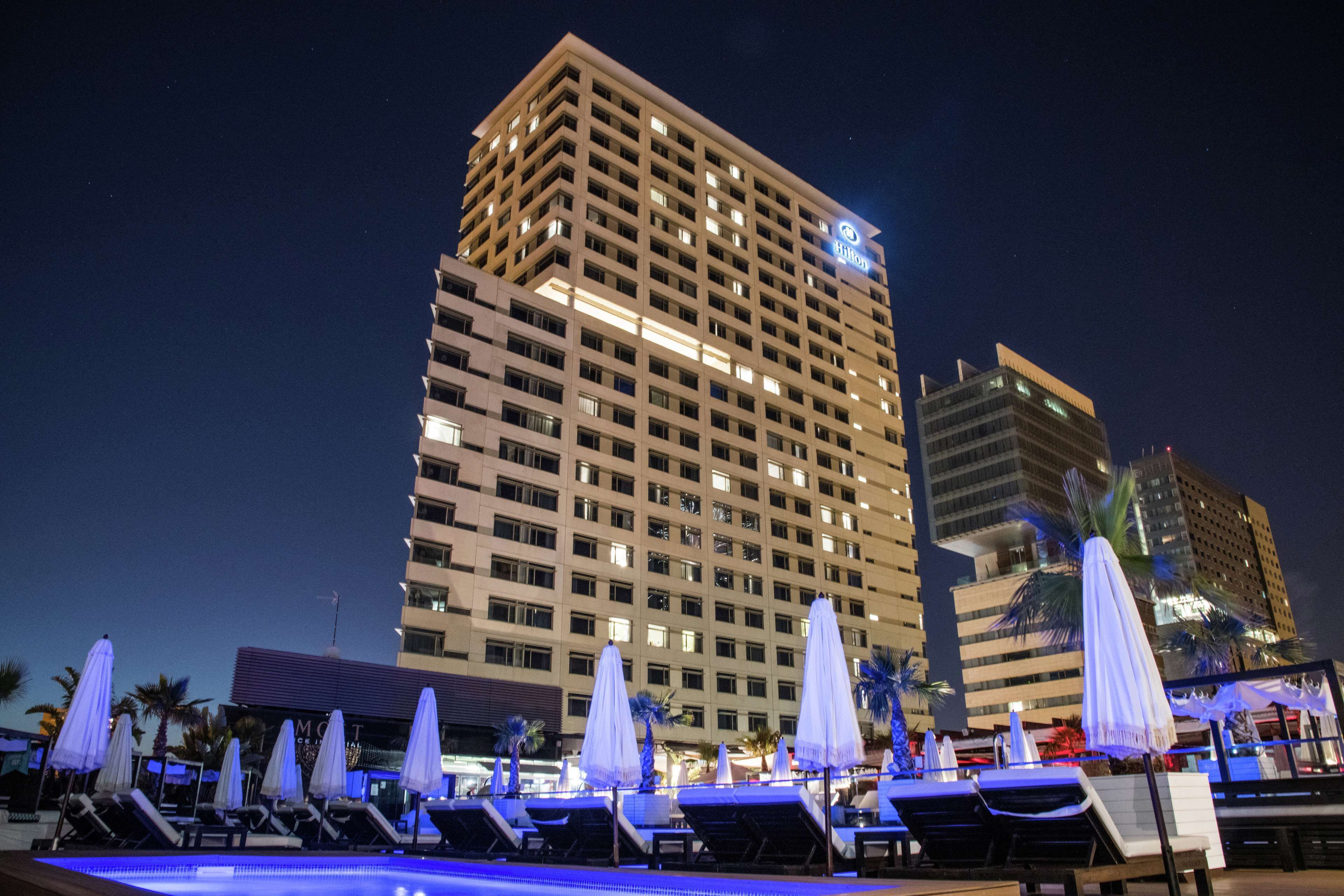 Seasonal outdoor pool, cabanas (surcharge), pool umbrellas