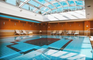 Indoor pool, sun loungers