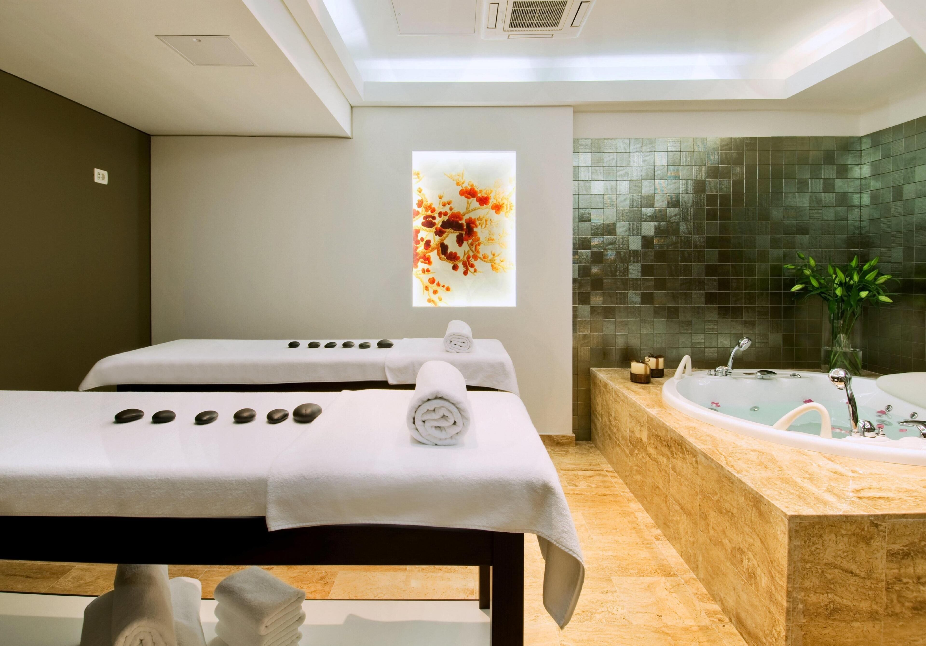 Couples treatment rooms, steam room, body treatments, hot stone massages