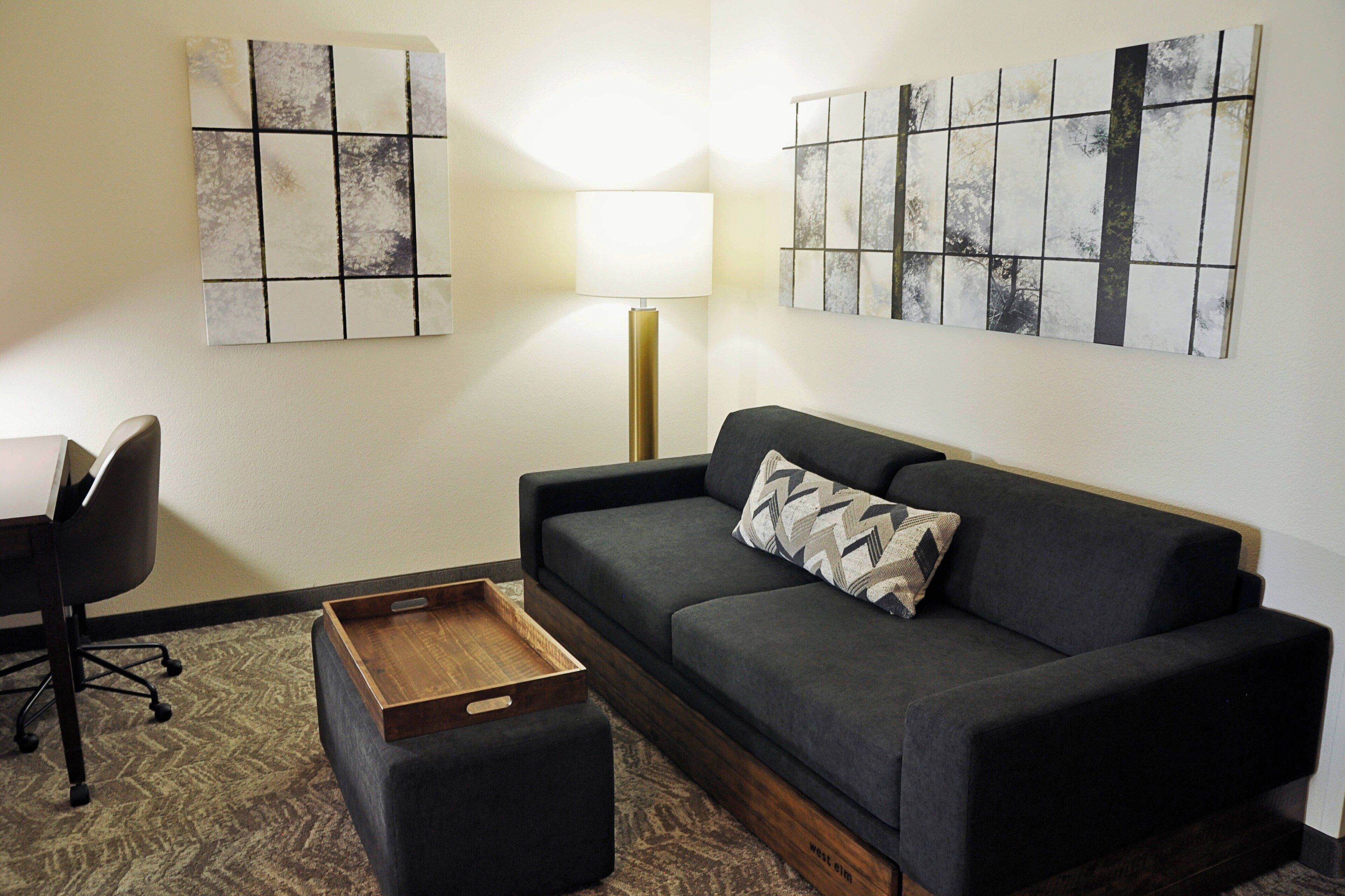 studio, multiple beds, non smoking | living area | 27-inch flat-screen tv with cable channels, tv, pay films