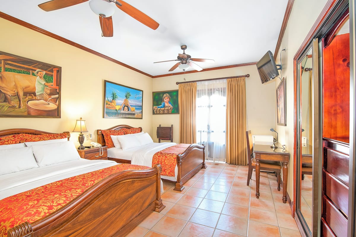 Deluxe Queen Room With Two queen Beds | 1 bedroom, premium bedding, minibar, in-room safe