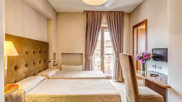 Twin Room | Minibar, in-room safe, individually furnished, desk