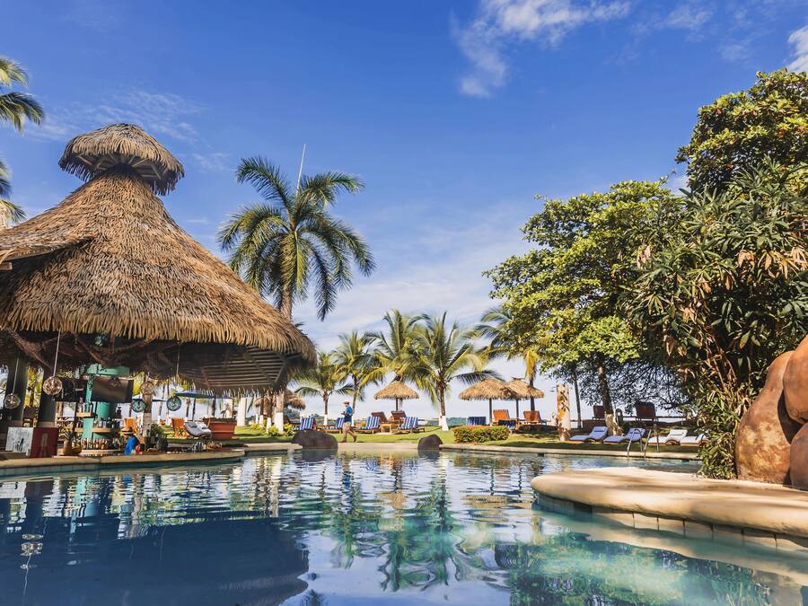 Outdoor pool, open 8:00 AM to 10:00 PM, pool umbrellas