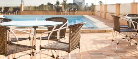 Outdoor pool, sun loungers